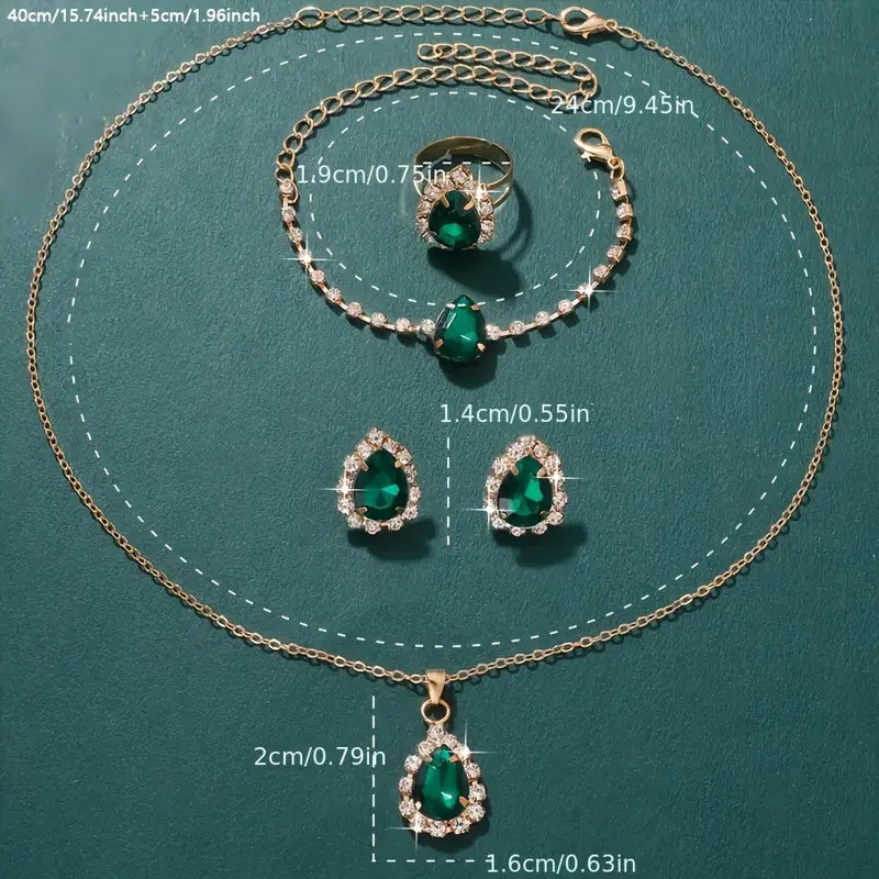 Schmuckset Elisandre Vermont in Gold, bestehend aus Halskette und Ohrringen von der Marke Rose & Oliver mit eleganten Details