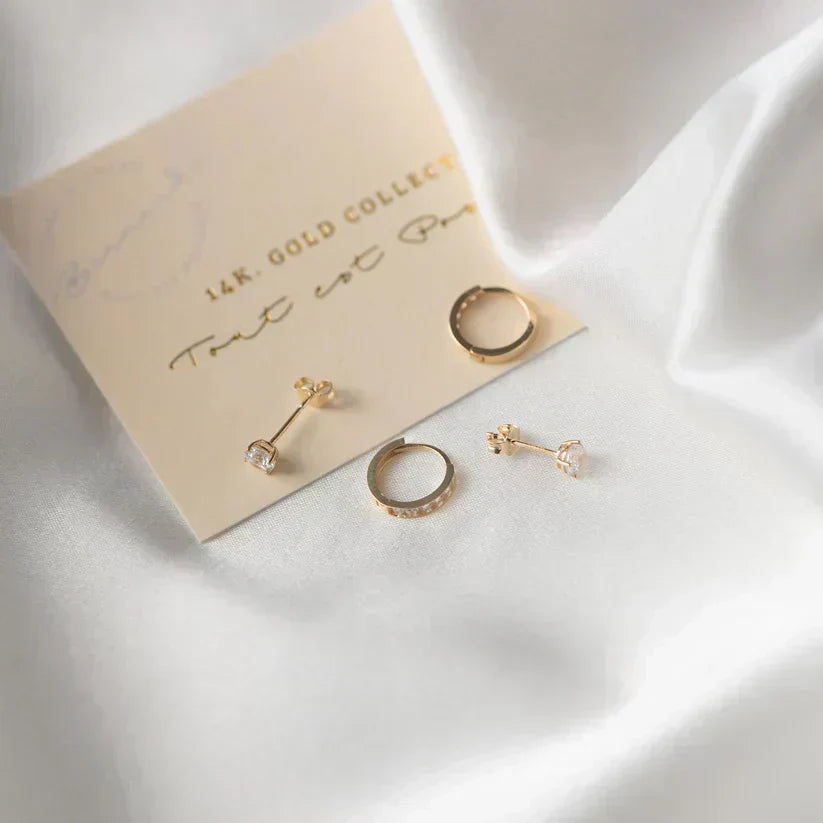 Pendientes de oro Larmes™ con piedra dorada de Rose & Oliver, estilo delicado y elegante, en imagen de pendientes de argolla.